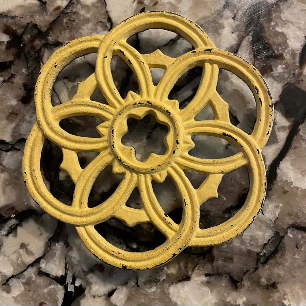 Trivet Antique Cast Iron Flower with Interlocking Circles Chippy Yellow Paint